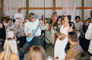 Dana and her dad Gene playing air guitar during the father daughter dance.