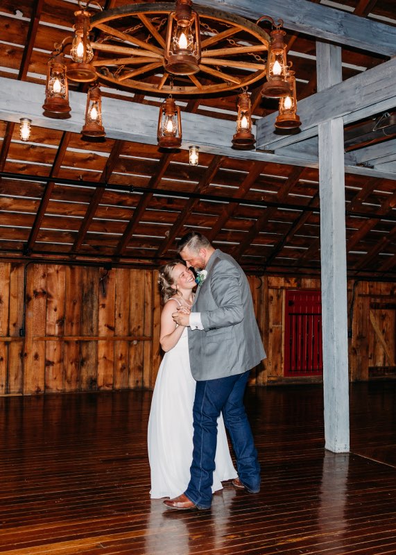Bride and groom share a private last dance at the end of their wedding night