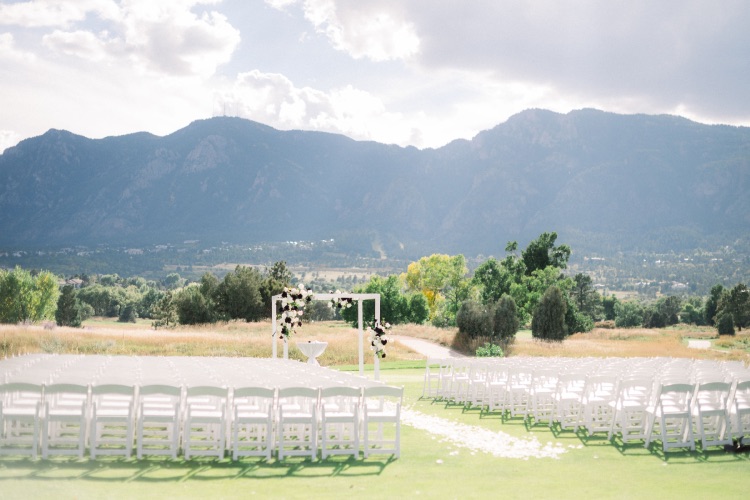 Beautiful outdoor wedding ceremony location surrounded by the Colorado Rocky Mountains